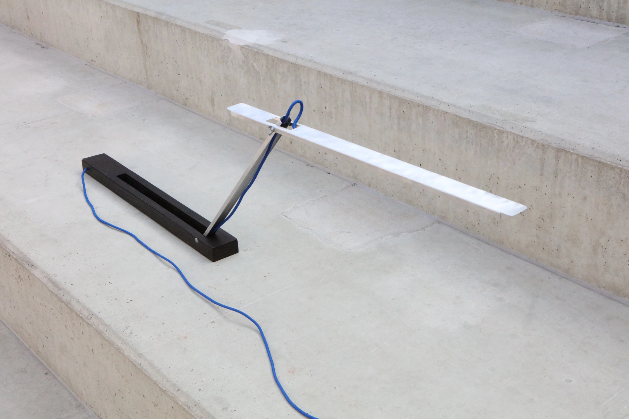 Zenvo desk lamp on concrete steps