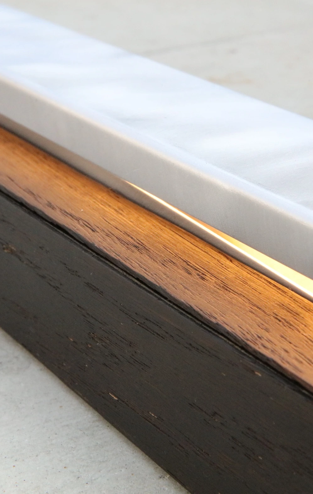 Zenvo illuminated aluminium and wood detail