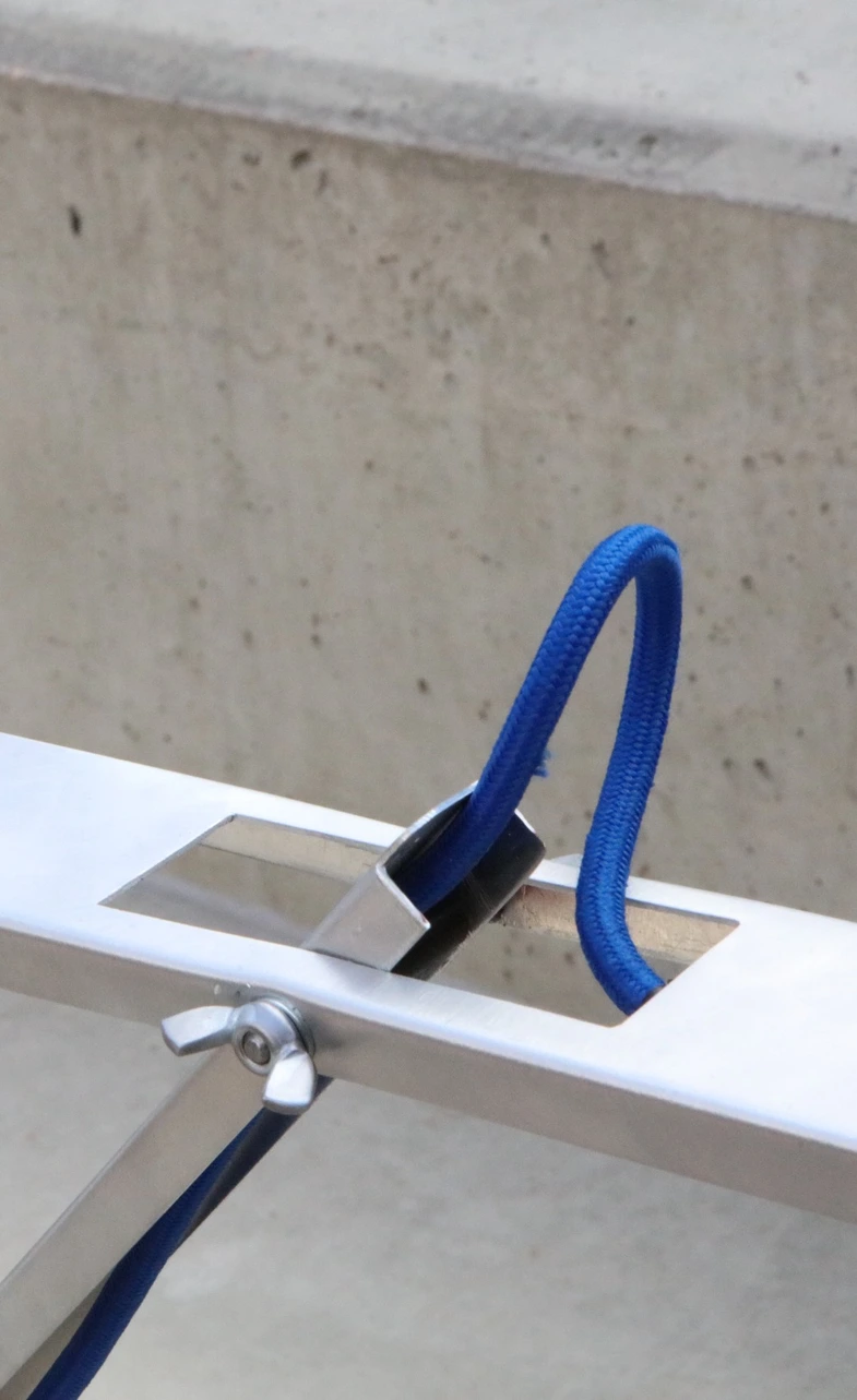 Zenvo hinge and blue cable close-up